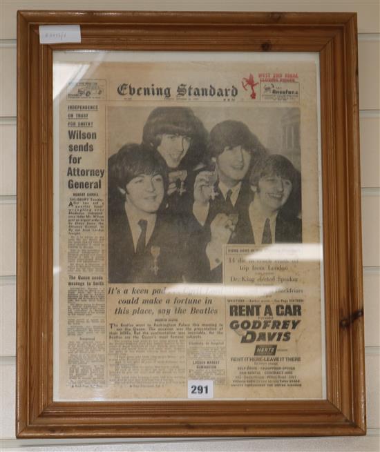 A 1965 framed Beatles MBE newspaper cutting